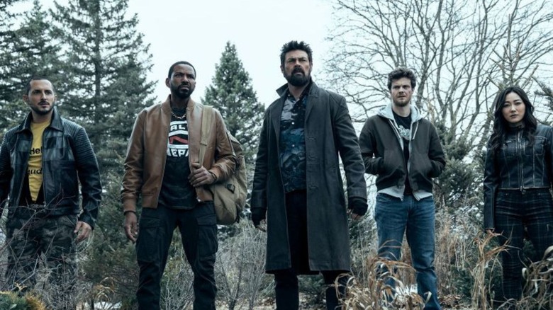 The Boys standing in field