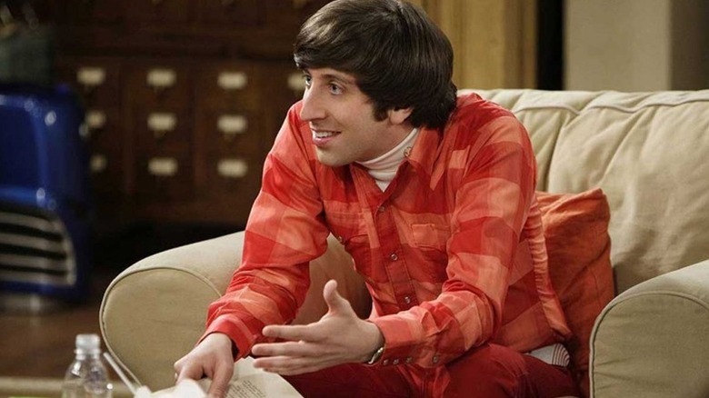 Howard leaning forward on an armchair on The Big Bang Theory