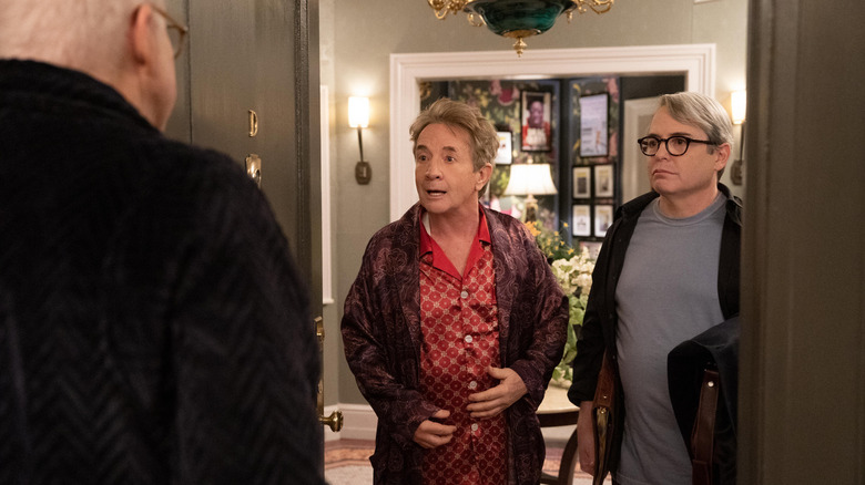 Oliver and Matthew Broderick in the doorway as Charles answers in "Only Murders in the Building" (2021-present)