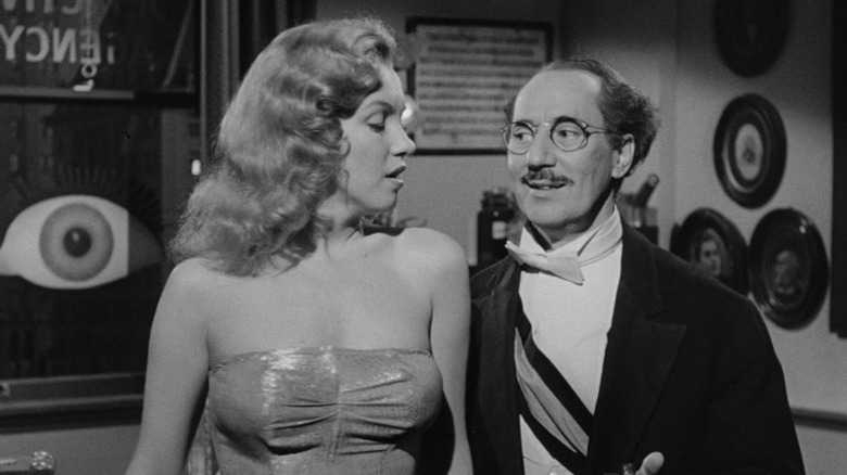 Monroe next to Groucho Marx