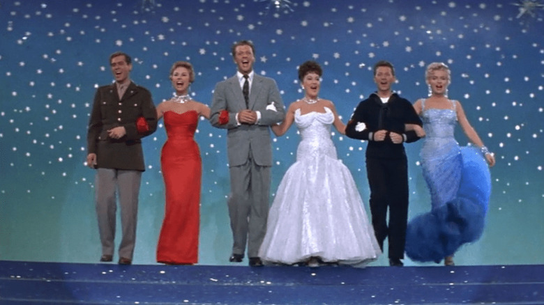 Monroe and castmates on stage 