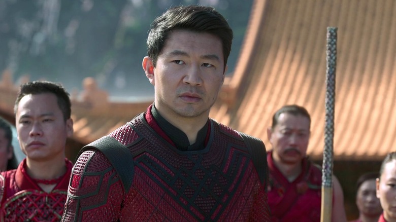 Shang-Chi looking to the side in Shang-Chi and the Legend of the Ten Rings
