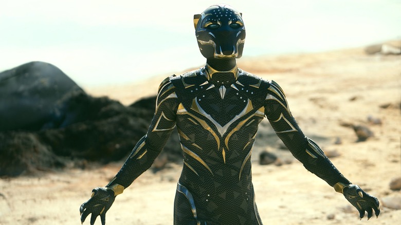 Shuri as Black Panther on a beach in "Black Panther: Wakanda Forever" (2022)