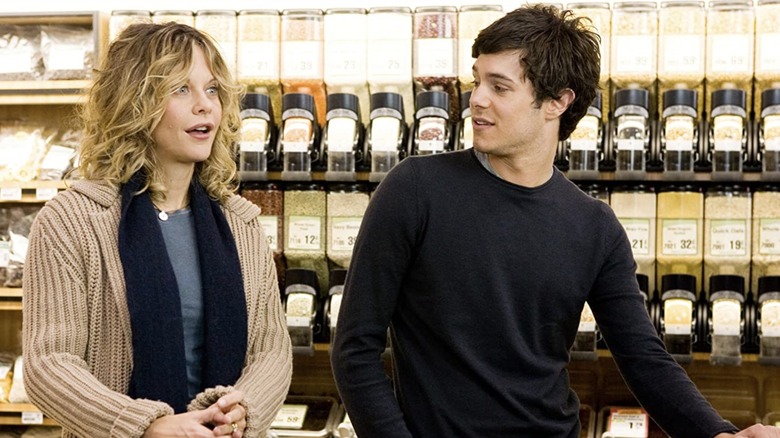 Sarah and Carter talking at the grocery store
