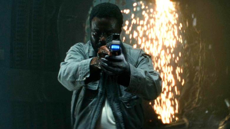 Morrow holding a gun on Slightly and Smee (off-screen)