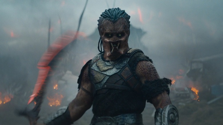 Dek stands on the battlefield in Predator: Badlands