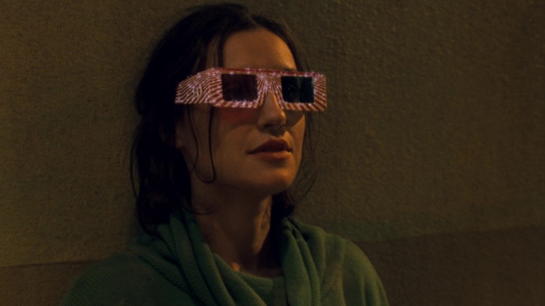Maggie (Lisa Zane) wearing 3d glasses