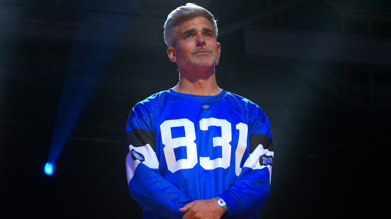 Jeffrey Allen wearing his player jersey in Beast Games