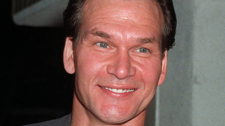 Patrick Swayze smiles