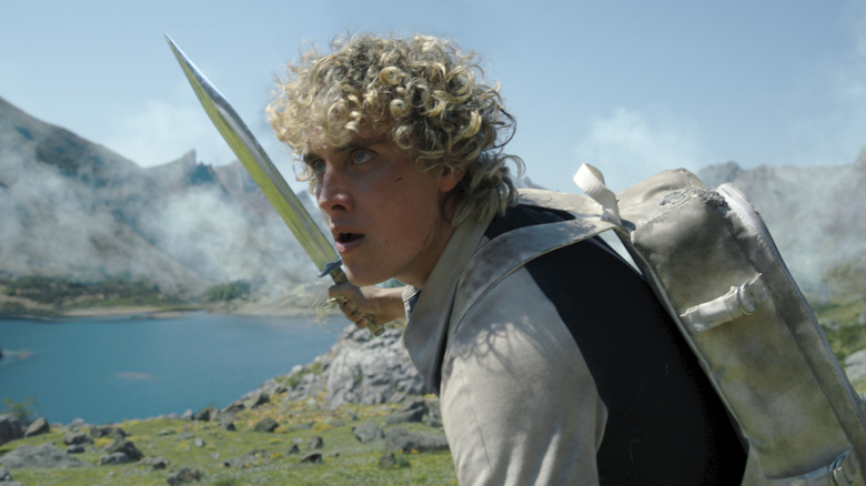 Haymitch drawing a huge knife in the arena in The Hunger Games: Sunrise on the Reaping