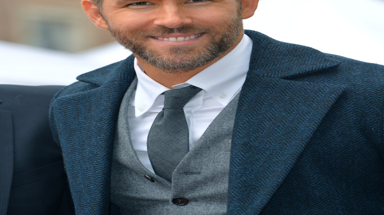 Ryan Reynolds smiles