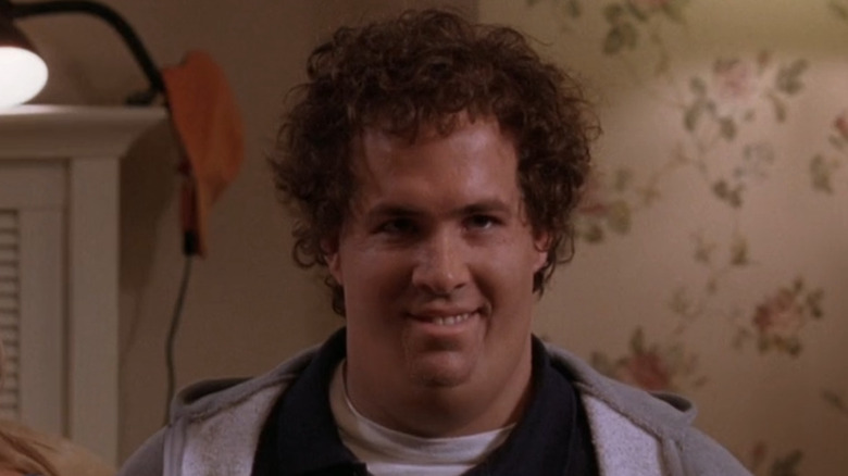 A heavier Ryan Reynolds smiles