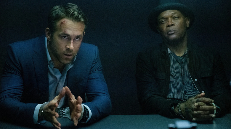 Ryan Reynolds sits next to Sam Jackson