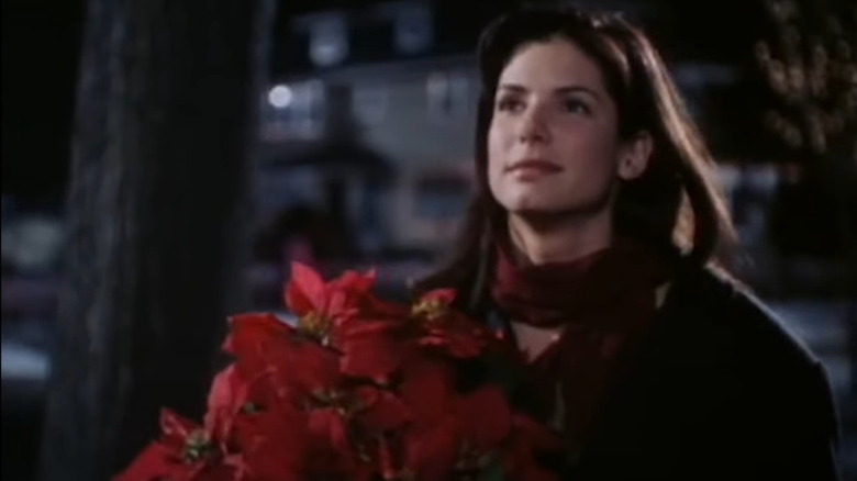 Lucy Eleanor Moderatz with flowers
