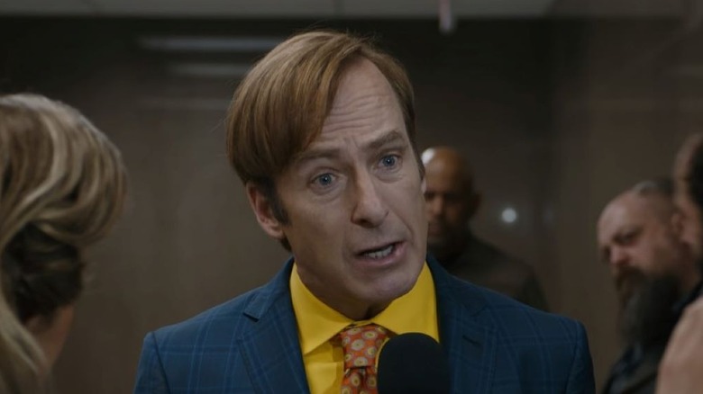 Saul Goodman talks into a microphone 