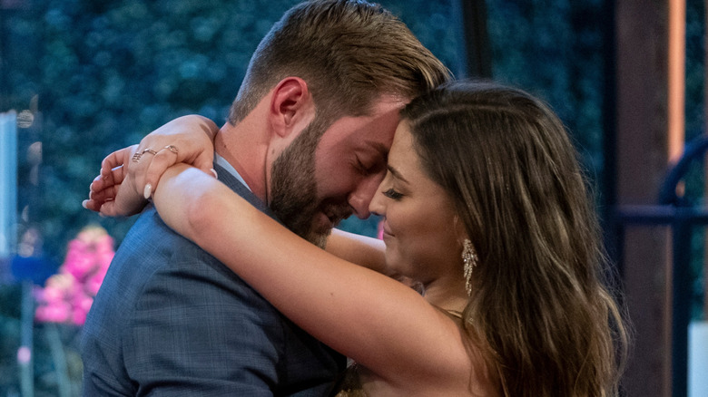 Matt and Colleen embracing with their foreheads together in "Love Is Blind."
