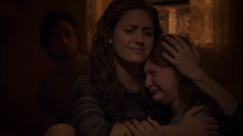 Fiona comforts a crying Debbie