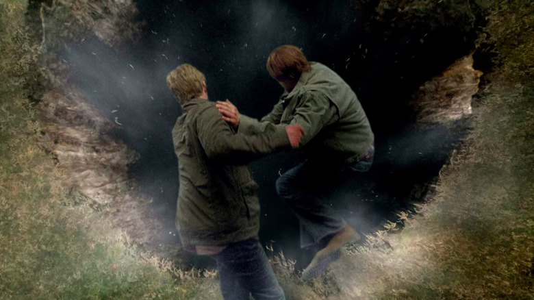 Sam possessed by Lucifer and Adam possessed by Michael dive into the pit to Hell