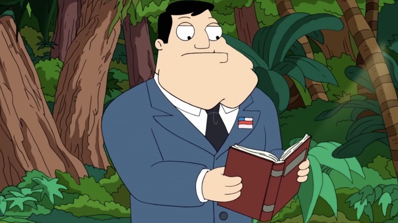 Stan reading a book