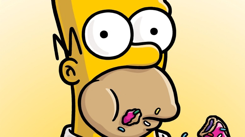 Homer Simpsons eating a donut
