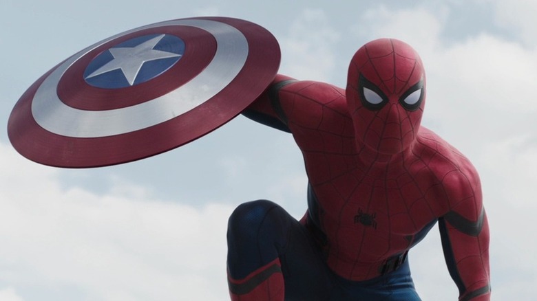 Spider-Man holding Captain America's shield in "Captain America: Civil War" (2016)