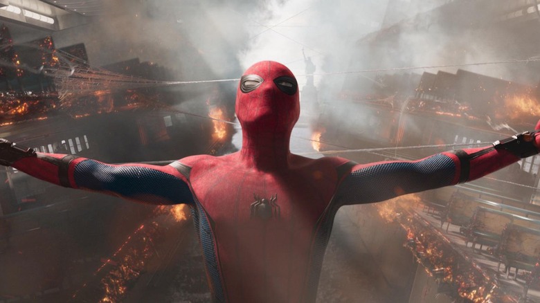 Spider-Man straining to hold ferry together in "Spider-Man: Homecoming" (2017)