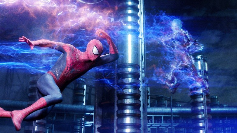 Spider-Man swinging past Electro in "The Amazing Spider-Man 2" (2014)