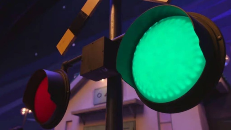 Green light illuminated on railroad crossing in Squid Game