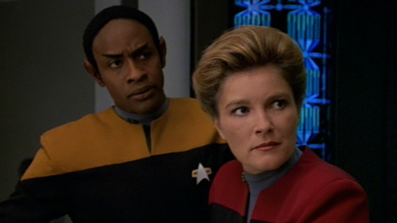 Janeway and Tuvok stand on the bridge in Star Trek: Voyager