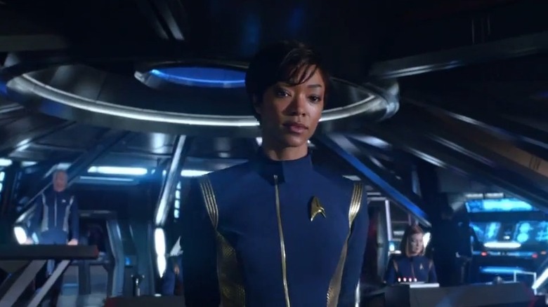 Burnham stands on the bridge of the Discovery in USS Discovery