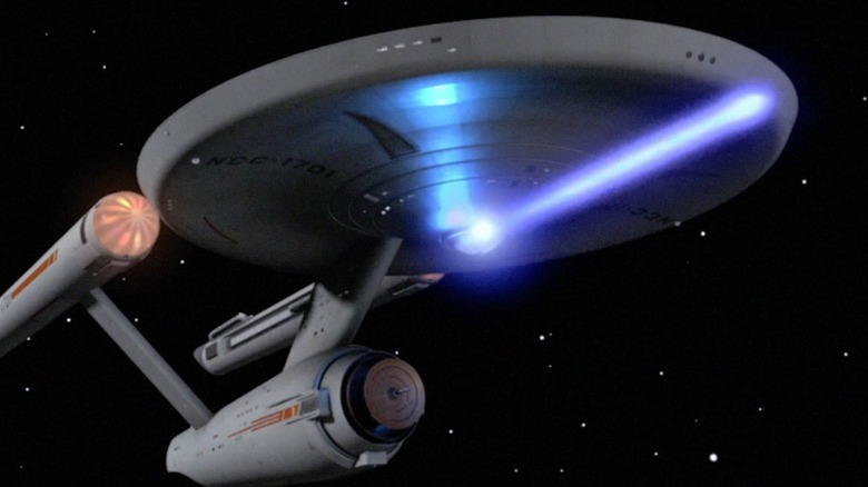 The USS Enterprise NCC-1701 firing phasers in "Star Trek"