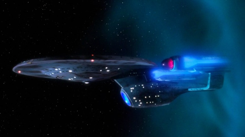 The USS Enterprise NCC-1701C emerging from a rift in spacetime in "Star Trek: The Next Generation"