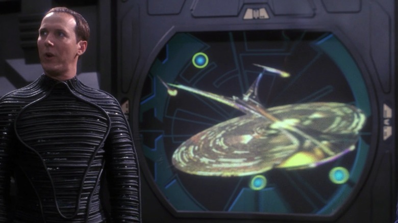 Agent Daniels displaying the USS Enterprise NCC-1701-J in "Star Trek: Enterprise"