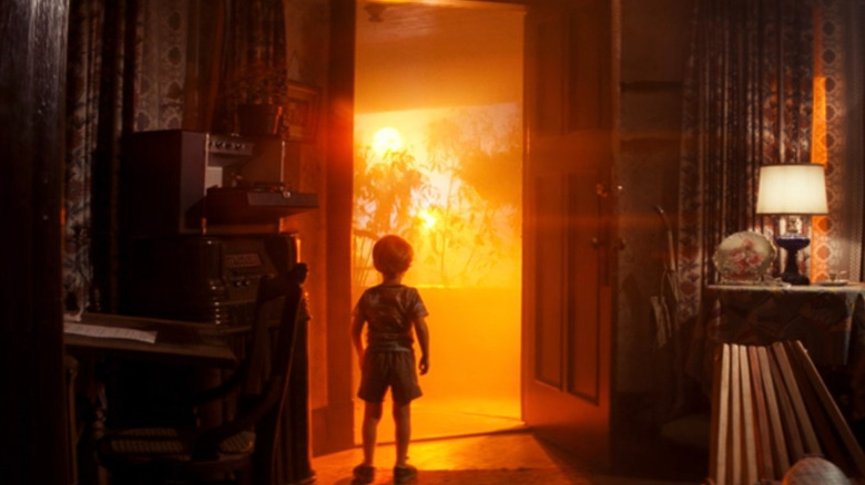 Barry Guiler looking at a glowing alien ship outside in "Close Encounters of the Third Kind" (1977)