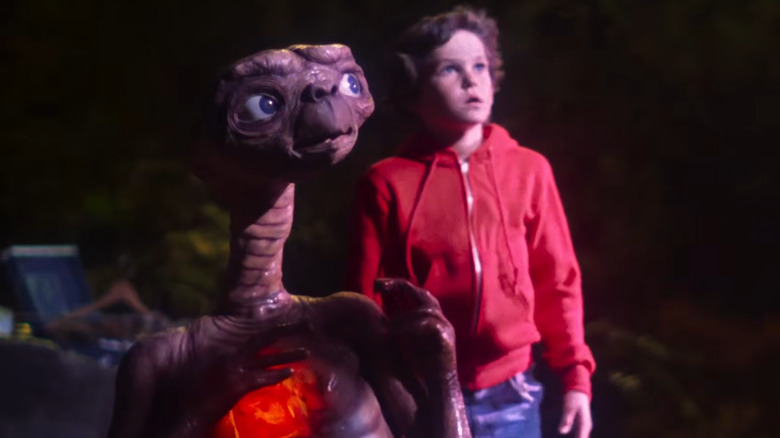 E.T. and Elliott watching the mothership land in "E.T. the Extra-Terrestrial" (1982)
