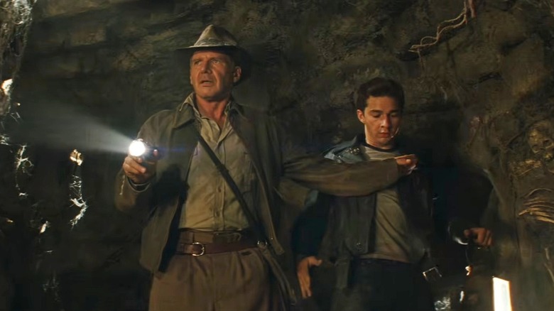 Indiana Jones stopping Mutt from moving forward in "Indiana Jones and the Kingdom of the Crystal Skull" (2008)