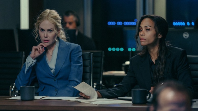 Joe McNamara and Kaitlyn Meade listen in a conference in 