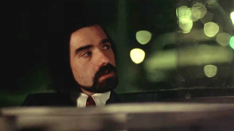 Passenger looking out taxi window