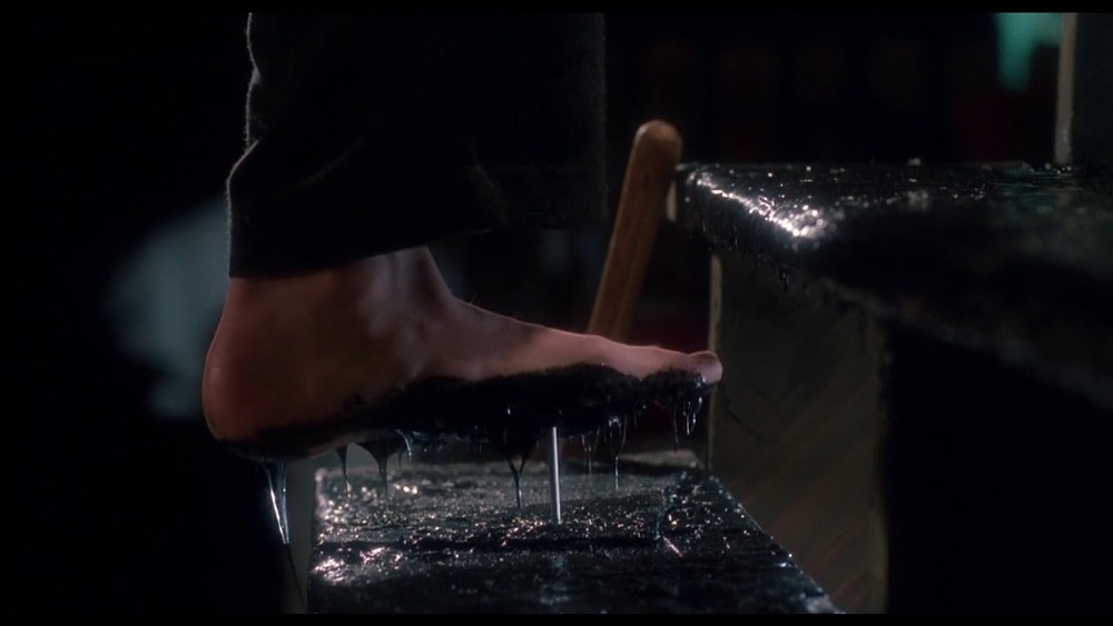 Marv steps on a nail in Home Alone