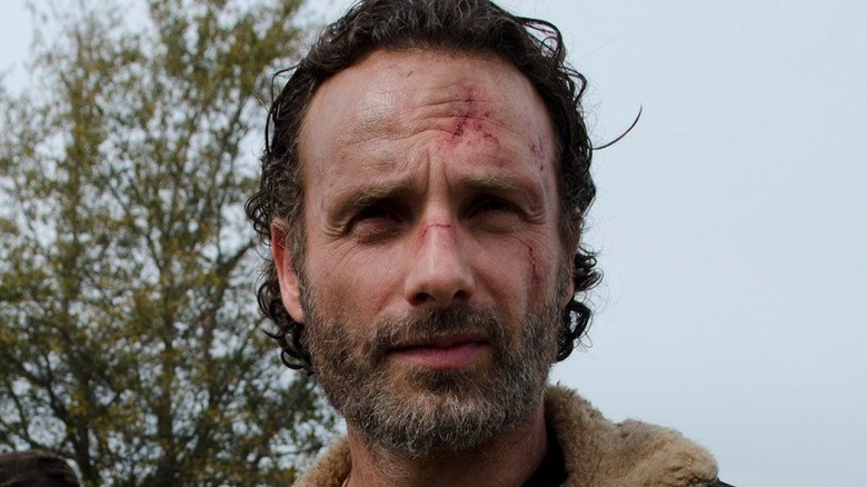 Rick Grimes with scrapes on his face The Walking Dead