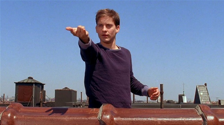 Peter Parker practicing shooting webs on the roof (2002)