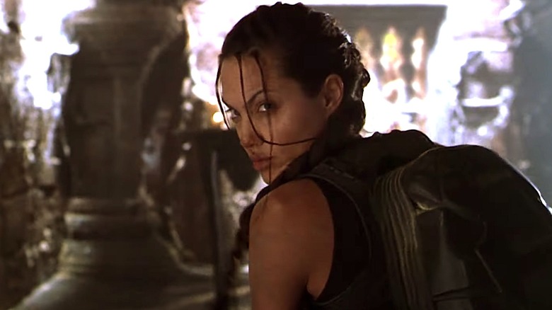 Lara Croft fighting bad guys