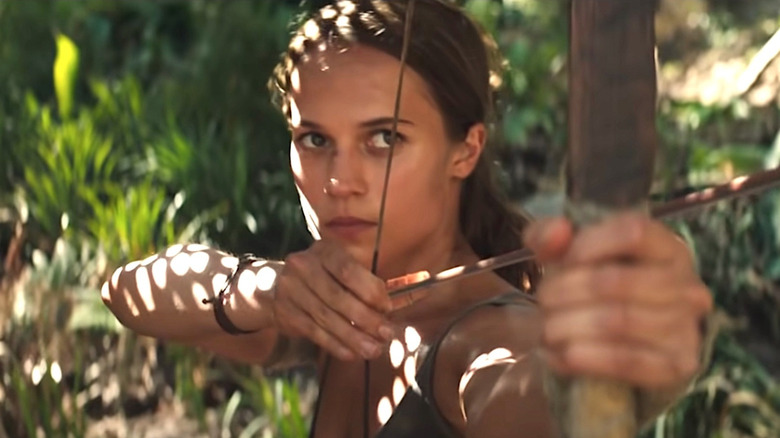 Lara Croft slinging arrows