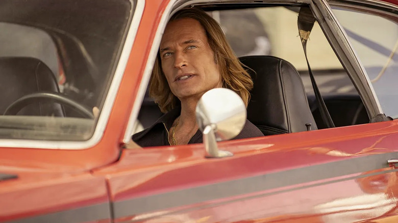 Jim musing from the driver's seat in "Duster"