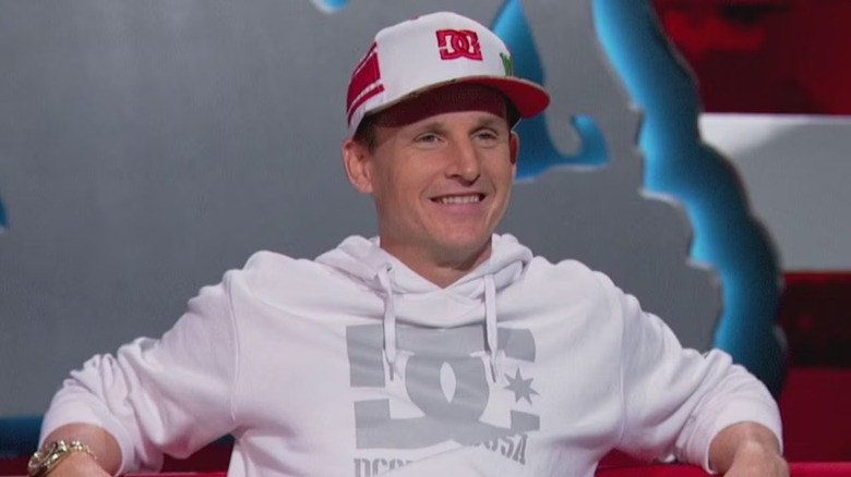 Rob Dyrdek grins on a couch for"Ridiculousness"