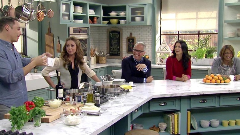 The chefs of "The Kitchen" pose together on-set in the first episode