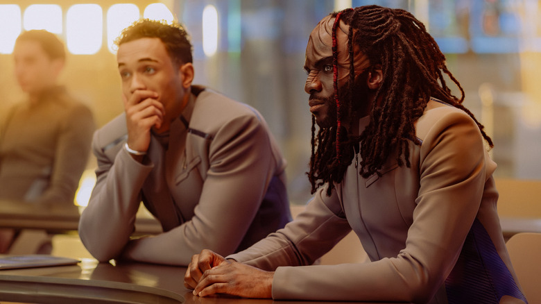 Caleb and Jay-Den look concerned in "Starfleet Academy"