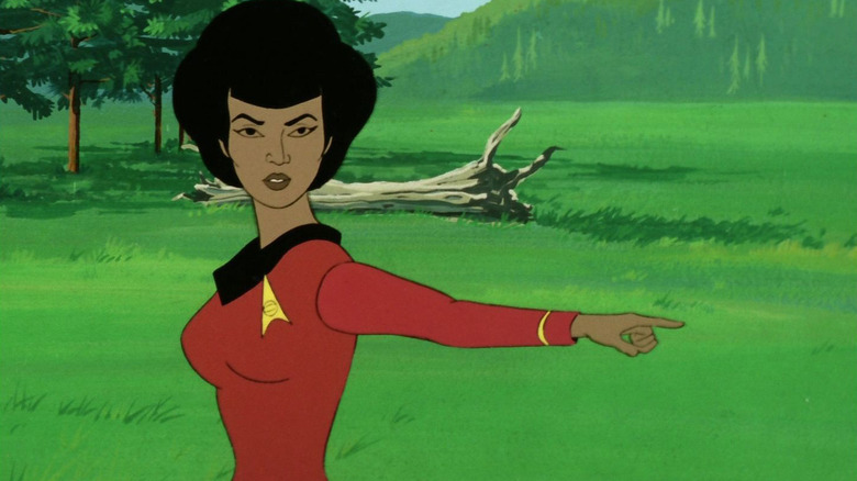Uhura points off into the distance in "Star Trek: The Animated Series" (1973)