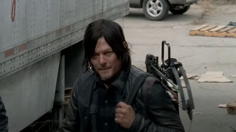 Daryl walks up stairs