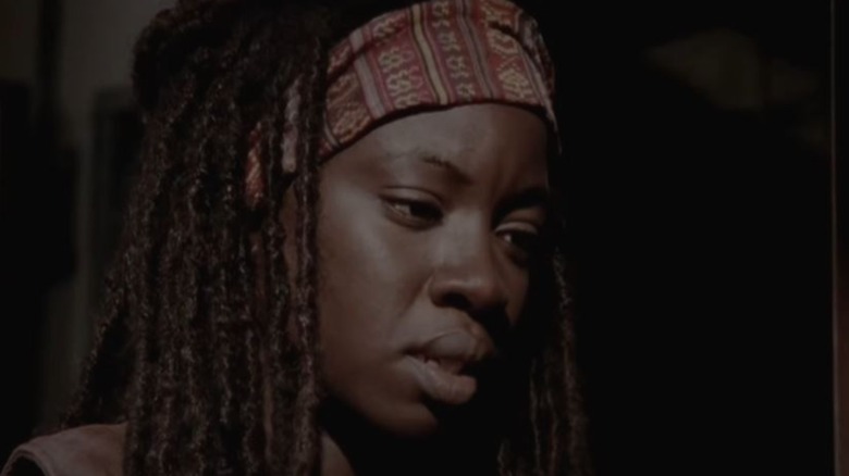 Michonne looks down